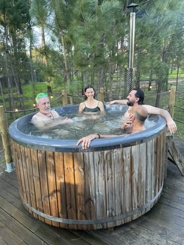 Wood-fired hot tub in the pines
