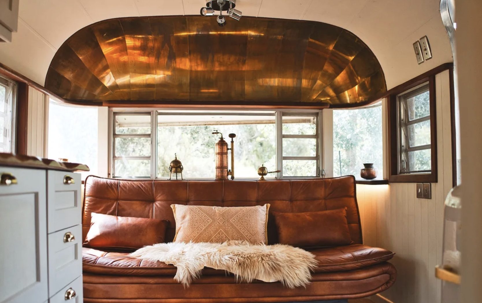 Silvia Airstream brass-domed lounge interior