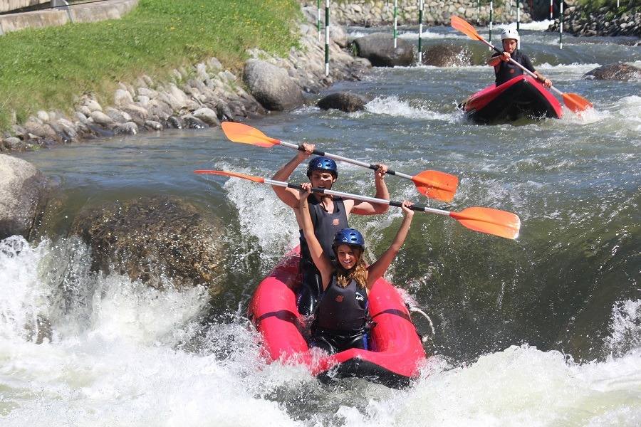 A family rafting on the whitewater course in the Cerdanya valley